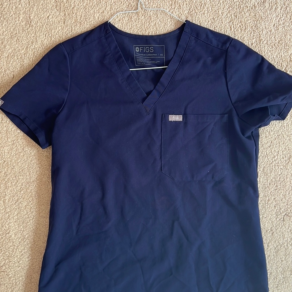 Figs Scrub Top! Nothing wrong just can’t wear this color anymore! One pocket!